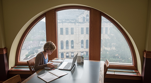 Student in library