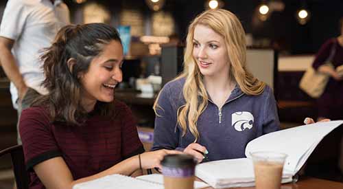 Two students meeting on campus